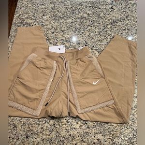 NWT Nike Teddy Bear Sherpa Sweatpants (windbreaker material)
